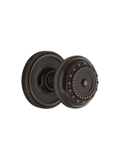 Classic Rosette Mortise Lock Set With Meadows Design Knobs in Timeless Bronze.